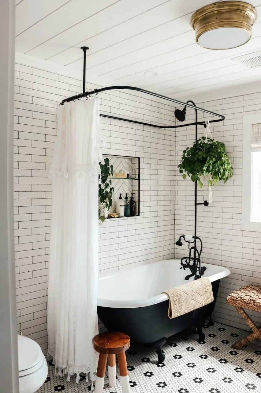 15 Glamorous Art Deco Bathroom Ideas & Tips for 2023 9 art deco bathroom interior design classic black claw bathtub