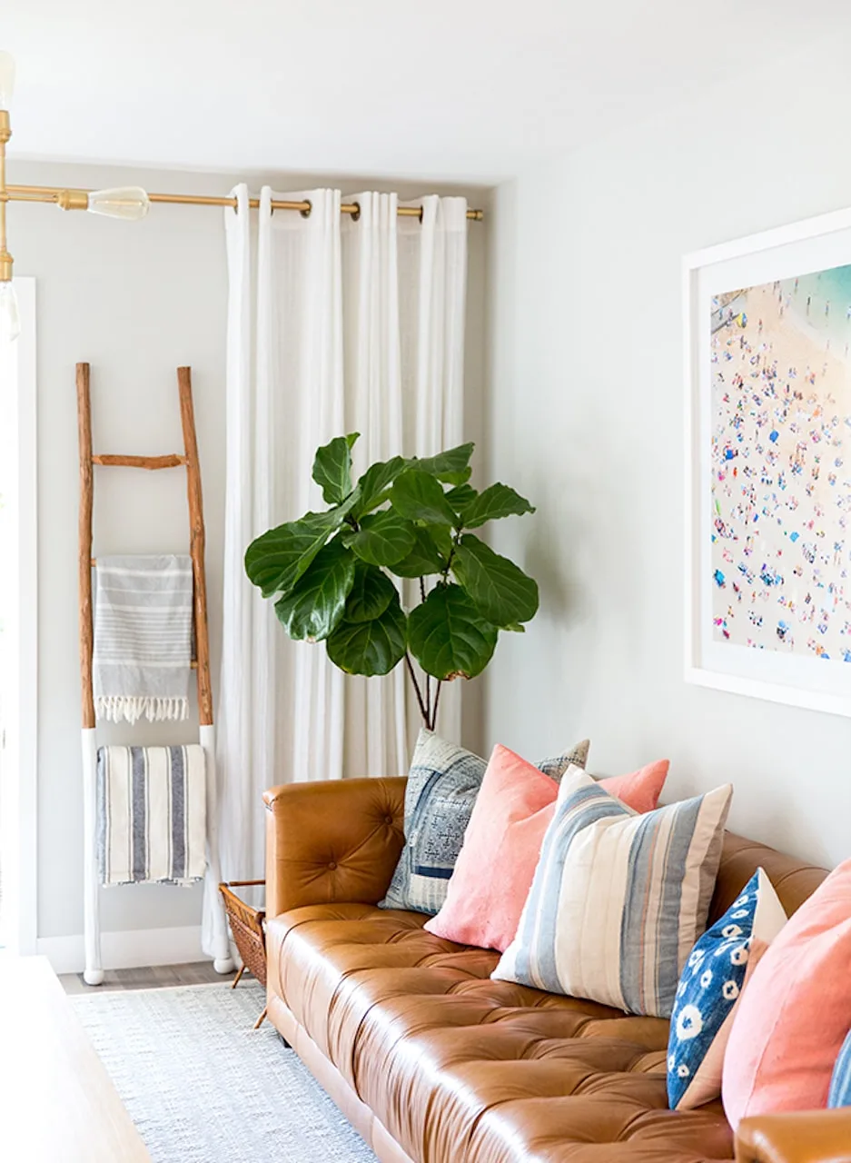 Boho Meets Beach: How to Design the Coastal Boho Interior of Your Dreams 6 coastal boho interior beach design leather couch