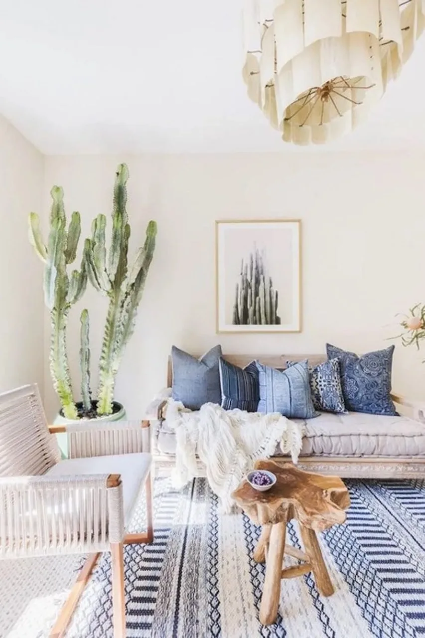 Boho Meets Beach: How to Design the Coastal Boho Interior of Your Dreams 9 coastal boho interior beach design living room cactus