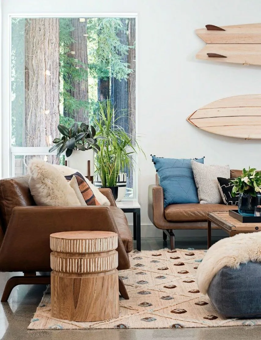 Boho Meets Beach: How to Design the Coastal Boho Interior of Your Dreams 1 coastal boho interior beach design nature surf boards e1678947571778