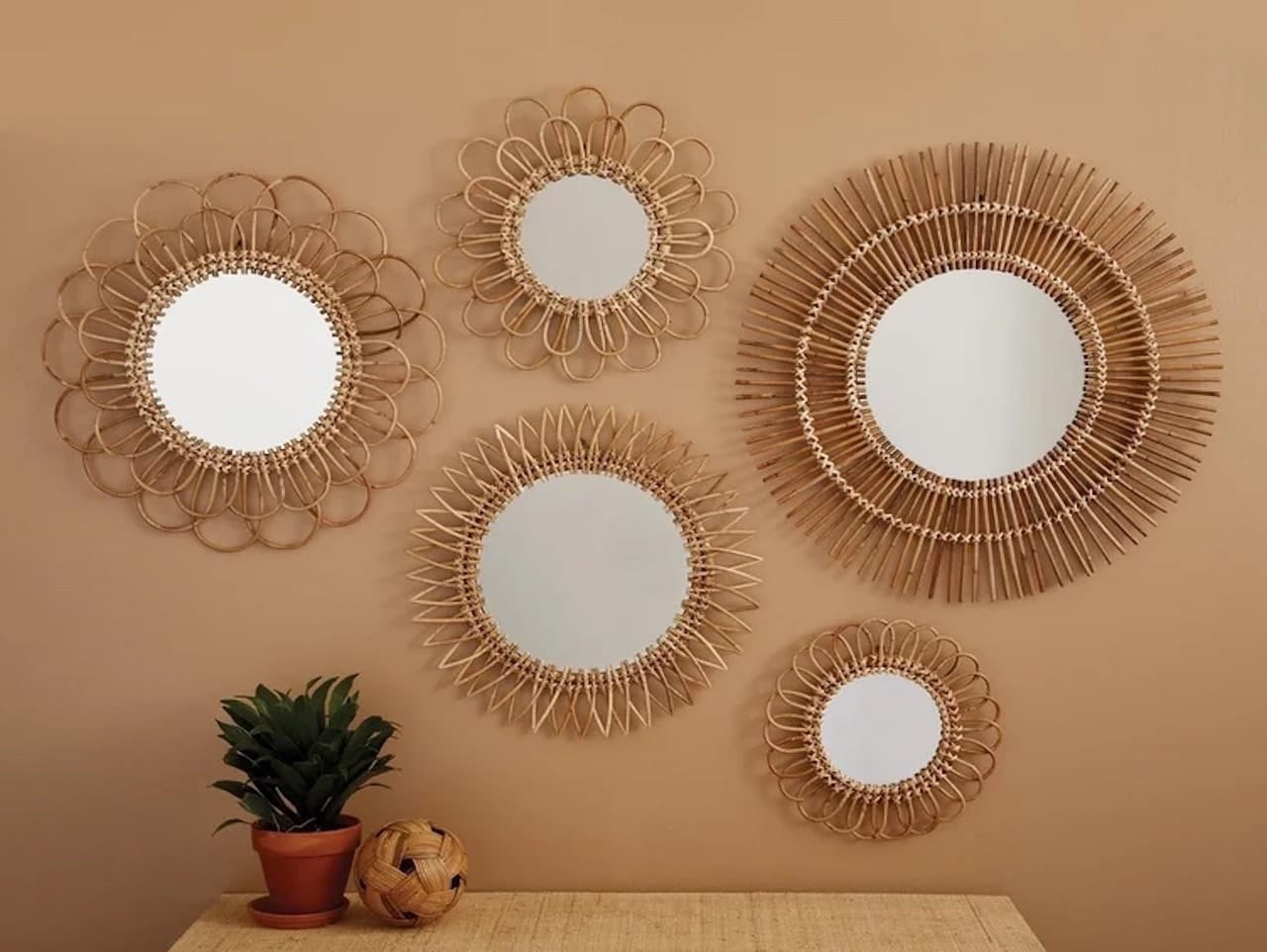 cozy earthy bedroom sunburst wicker mirros