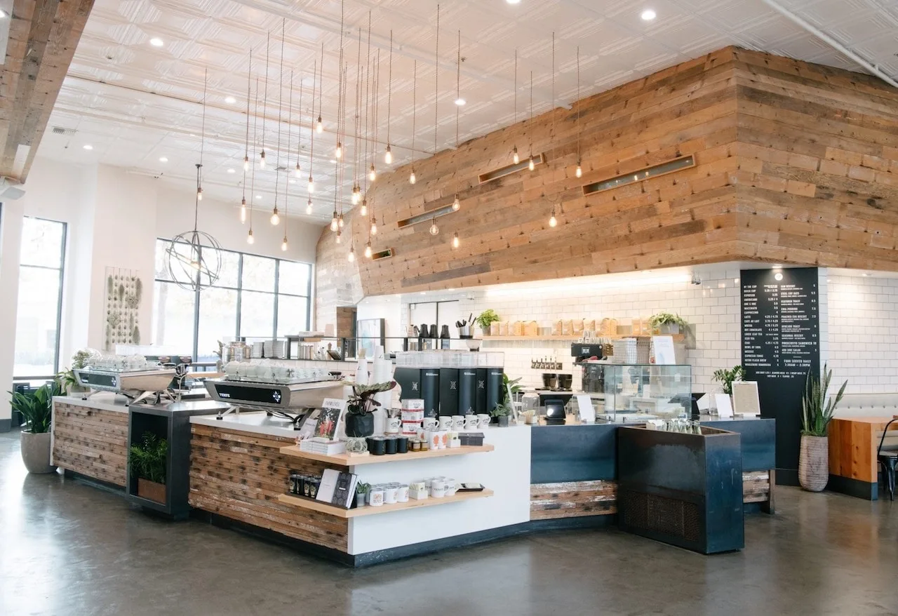 11 Aesthetic Coffee Shop Decor Ideas That'll Keep Customers Coming Back 11 coffee shop decor ideas natural lighting