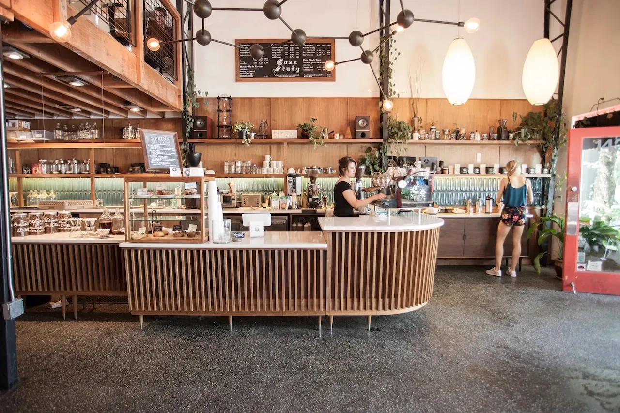 11 Aesthetic Coffee Shop Decor Ideas That'll Keep Customers Coming Back 17 coffee shop decor ideas wood paneling
