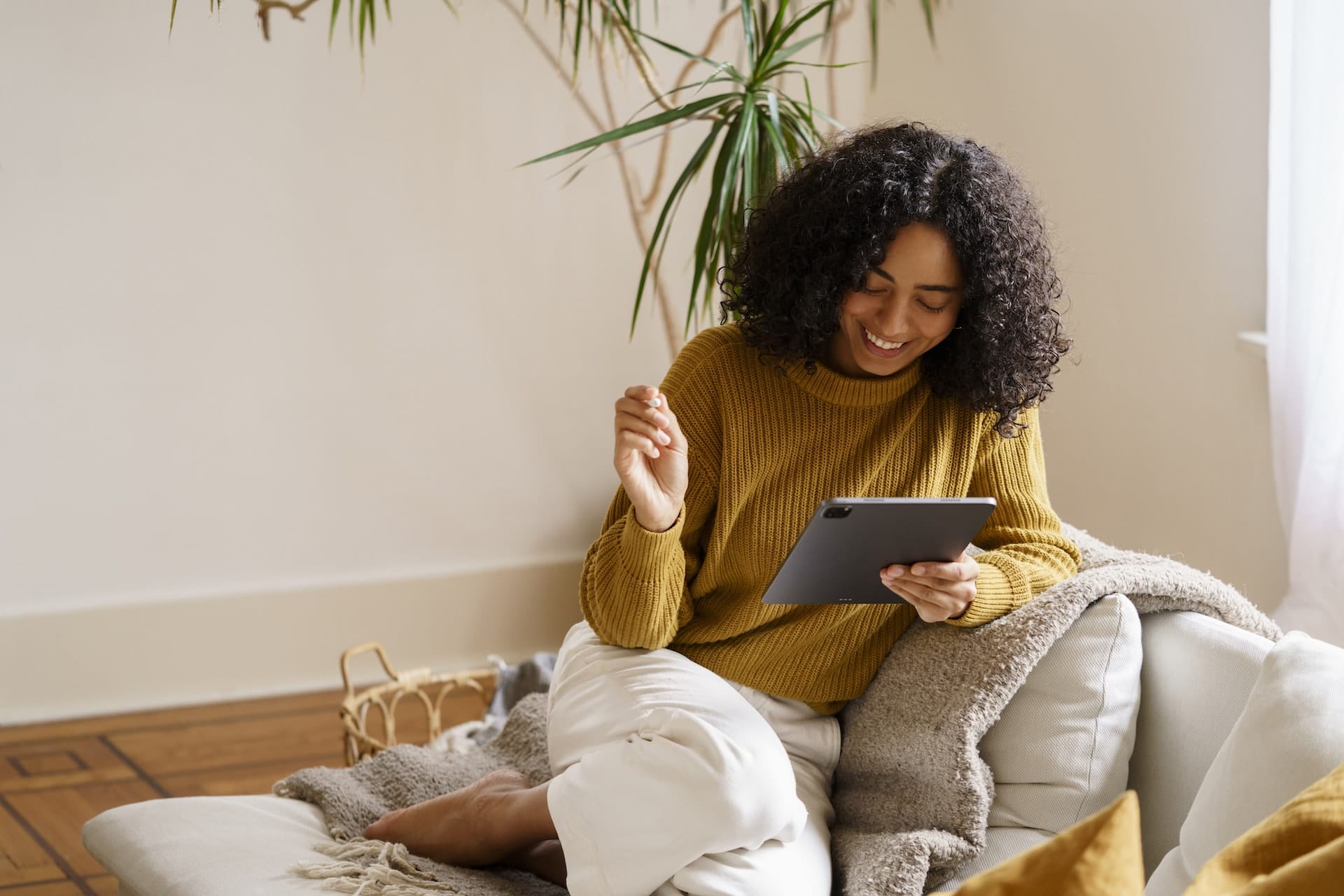 shift-energy-in-your-home_happy-woman-at-home