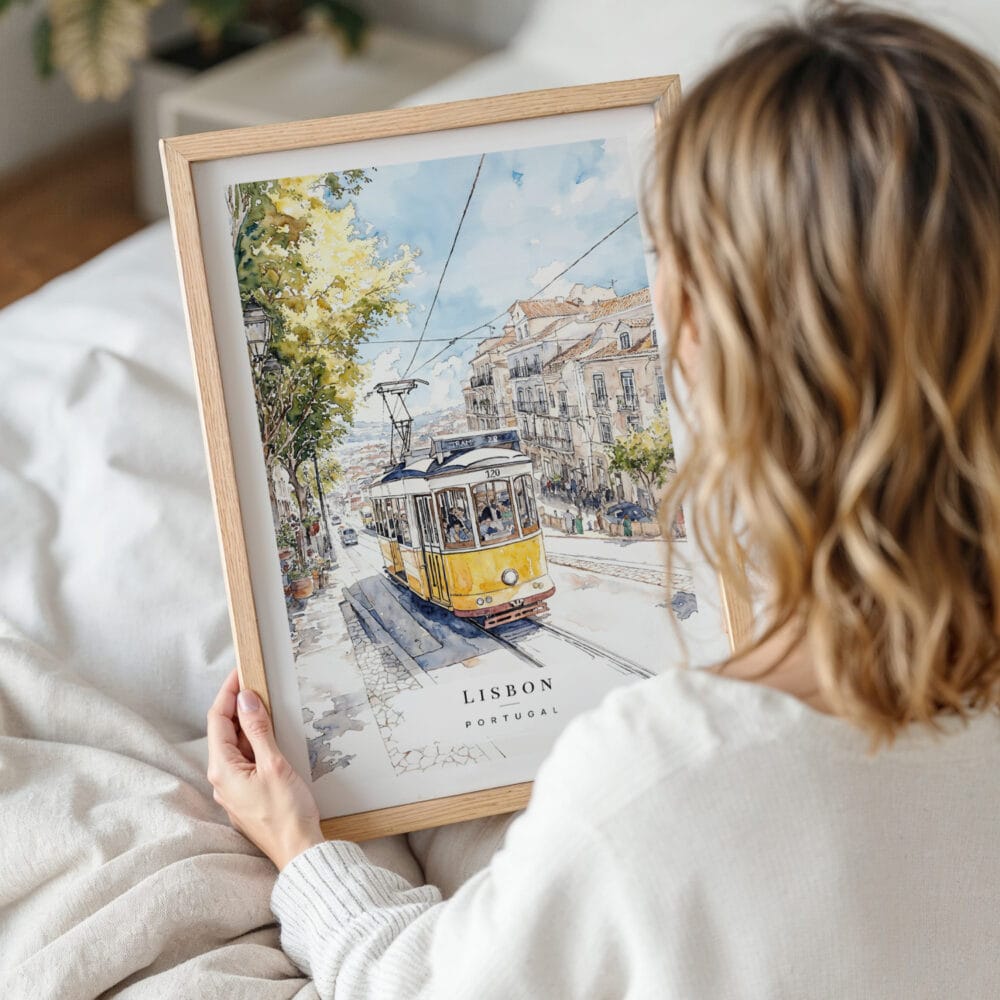 Framed Lisbon Portugal Watercolor Print with Tram 28 Wall Art - Woman Holding - Portrait Framed Lisbon Portugal Watercolor Print with Tram 28 Wall Art - Woman Holding - Portrait