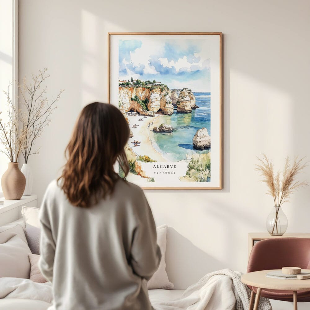 Framed Algarve Beach Watercolor Wall Art - In Living Room with Woman Looking at it - Portrait Framed Algarve Beach Watercolor Wall Art - In Living Room with Woman Looking at it - Portrait