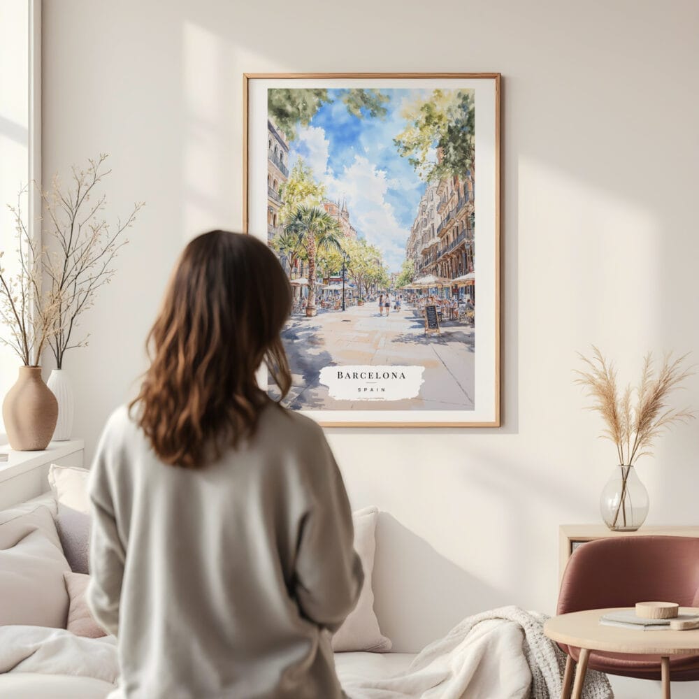 Framed Barcelona Watercolor Wall Art - In Living Room with Woman Looking at it - Portrait Framed Barcelona Watercolor Wall Art - In Living Room with Woman Looking at it - Portrait
