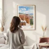 Framed Bryce Canyon Watercolor Wall Art - In Living Room with Woman Looking at it - Portrait