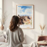 Framed Canyonlands National Park Watercolor Wall Art - In Living Room with Woman Looking at it - Portrait