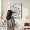 Framed Copenhagen Denmark Watercolor Wall Art - In Living Room with Woman Looking at it - Portrait