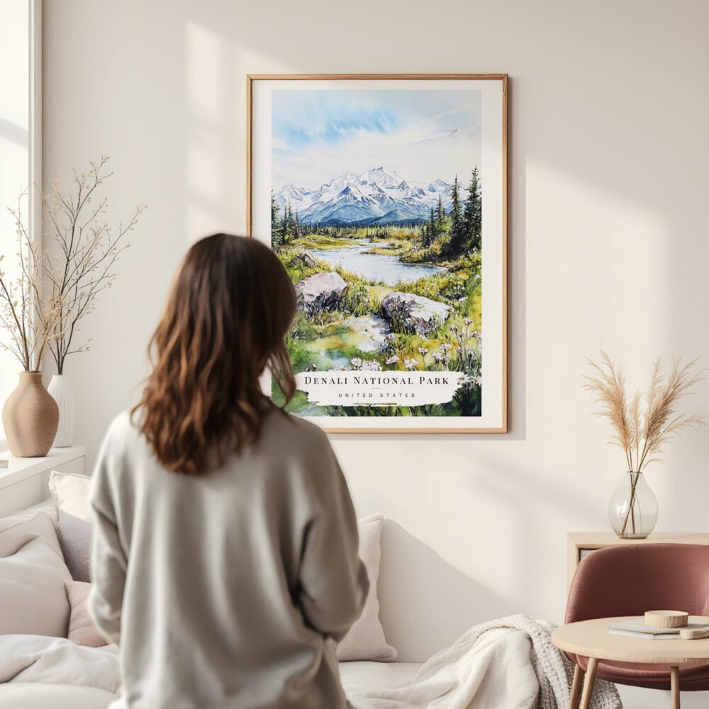Framed Denali National Park Watercolor Wall Art - In Living Room with Woman Looking at it - Portrait Framed Denali National Park Watercolor Wall Art - In Living Room with Woman Looking at it - Portrait