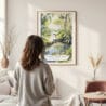 Framed Everglades National Park Watercolor Wall Art - In Living Room with Woman Looking at it - Portrait
