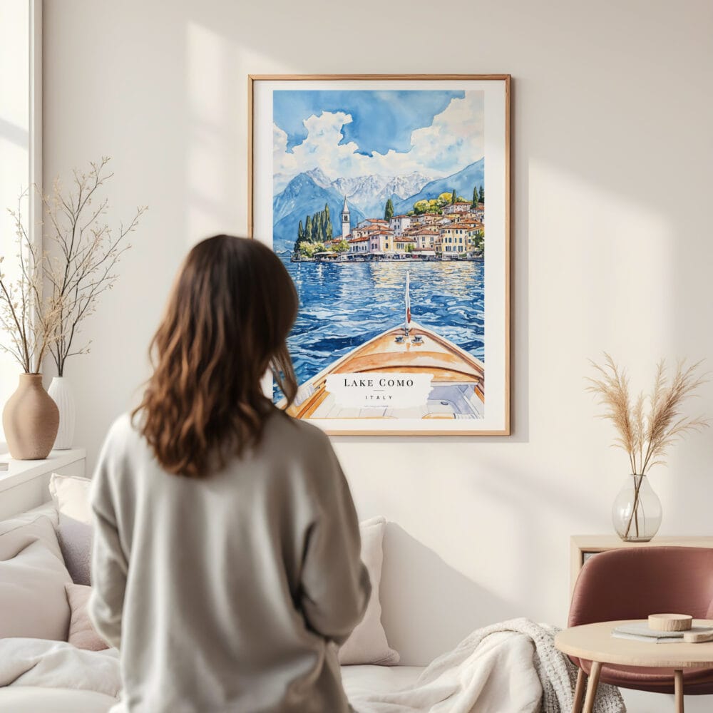 Framed Lake Como View from Boat Watercolor Wall Art - In Living Room with Woman Looking at it - Portrait Framed Lake Como View from Boat Watercolor Wall Art - In Living Room with Woman Looking at it - Portrait
