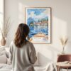 Framed Lake Como View from Boat Watercolor Wall Art - In Living Room with Woman Looking at it - Portrait