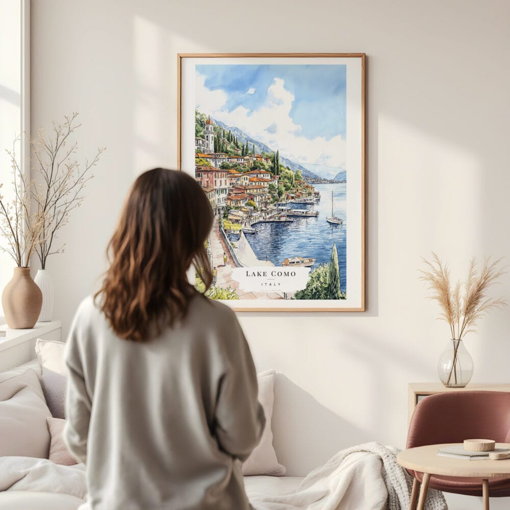 Framed Lake Como Watercolor Wall Art - In Living Room with Woman Looking at it - Portrait Framed Lake Como Watercolor Wall Art - In Living Room with Woman Looking at it - Portrait