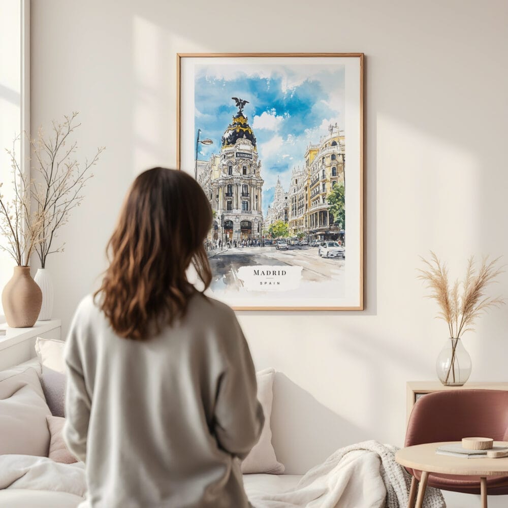 Framed Madrid Watercolor Wall Art - In Living Room with Woman Looking at it - Portrait Framed Madrid Watercolor Wall Art - In Living Room with Woman Looking at it - Portrait