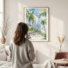 Framed Miami Beach Watercolor Wall Art - In Living Room with Woman Looking at it - Portrait