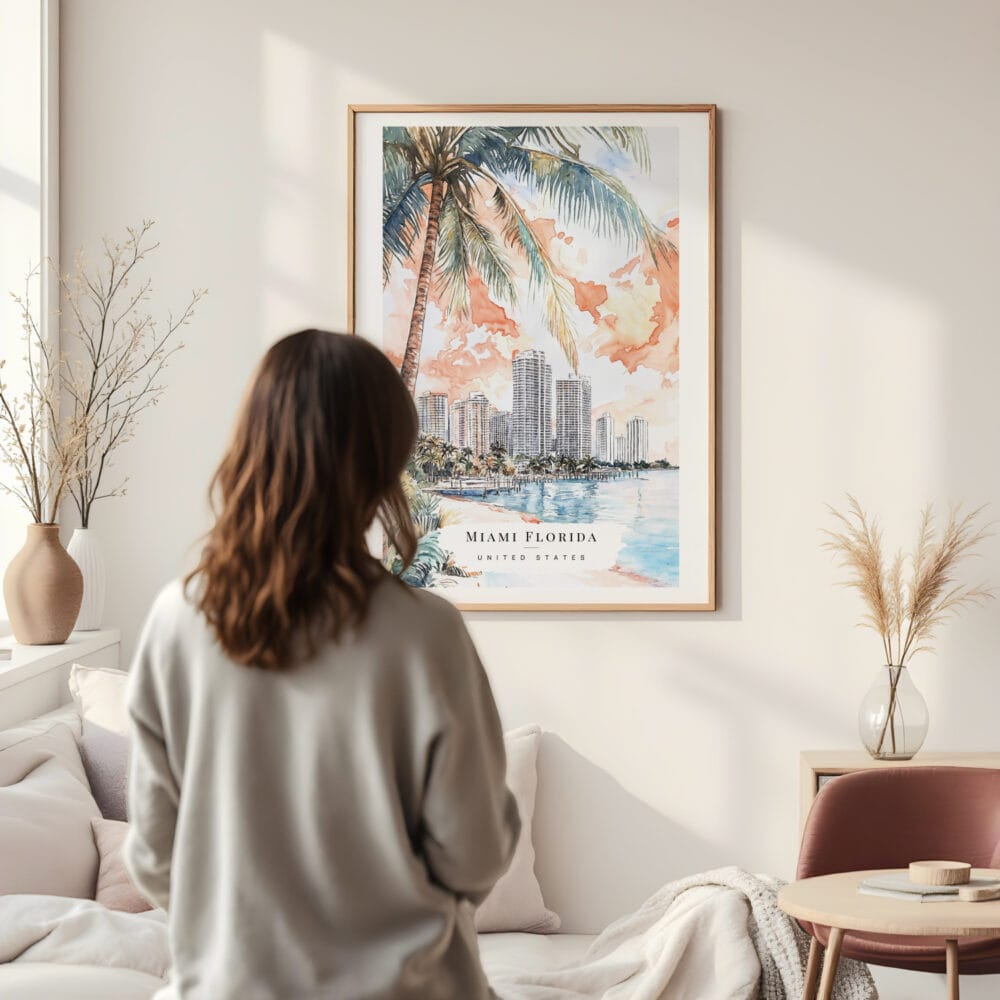 Framed Miami Florida Sunset Watercolor Wall Art - In Living Room with Woman Looking at it - Portrait Framed Miami Florida Sunset Watercolor Wall Art - In Living Room with Woman Looking at it - Portrait