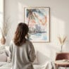 Framed Miami Florida Sunset Watercolor Wall Art - In Living Room with Woman Looking at it - Portrait