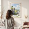 Framed Peak District England Watercolor Wall Art - In Living Room with Woman Looking at it - Portrait