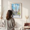 Framed Philadelphia City Hall Watercolor Wall Art - In Living Room with Woman Looking at it - Portrait
