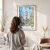Framed Philadelphia City Hall Watercolor Wall Art - In Living Room with Woman Looking at it - Portrait
