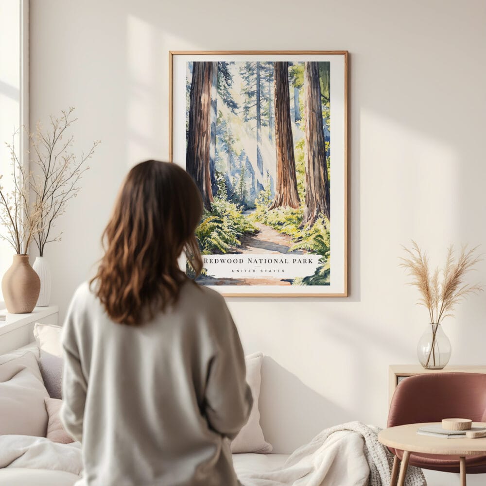 Framed Redwood National Park Watercolor Wall Art - In Living Room with Woman Looking at it - Portrait Framed Redwood National Park Watercolor Wall Art - In Living Room with Woman Looking at it - Portrait