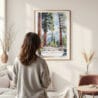 Framed Sequoia California Watercolor Wall Art - In Living Room with Woman Looking at it - Portrait