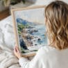 Woman Holding Framed Big Sur Watercolor Wall Art - Portrait