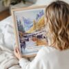 Woman Holding Framed Canadian Rocky Mountains Watercolor Wall Art - Portrait