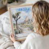 Woman Holding Framed Joshua Tree National Park Watercolor Wall Art - Portrait