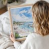 Woman Holding Framed Laguna Beach Coast Watercolor Wall Art - Portrait