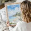Woman Holding Framed Laguna Beach Watercolor Wall Art - Portrait