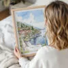 Woman Holding Framed Lake Como Watercolor Wall Art - Portrait