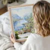 Woman Holding Framed Norwegian Fjords Watercolor Wall Art - Portrait