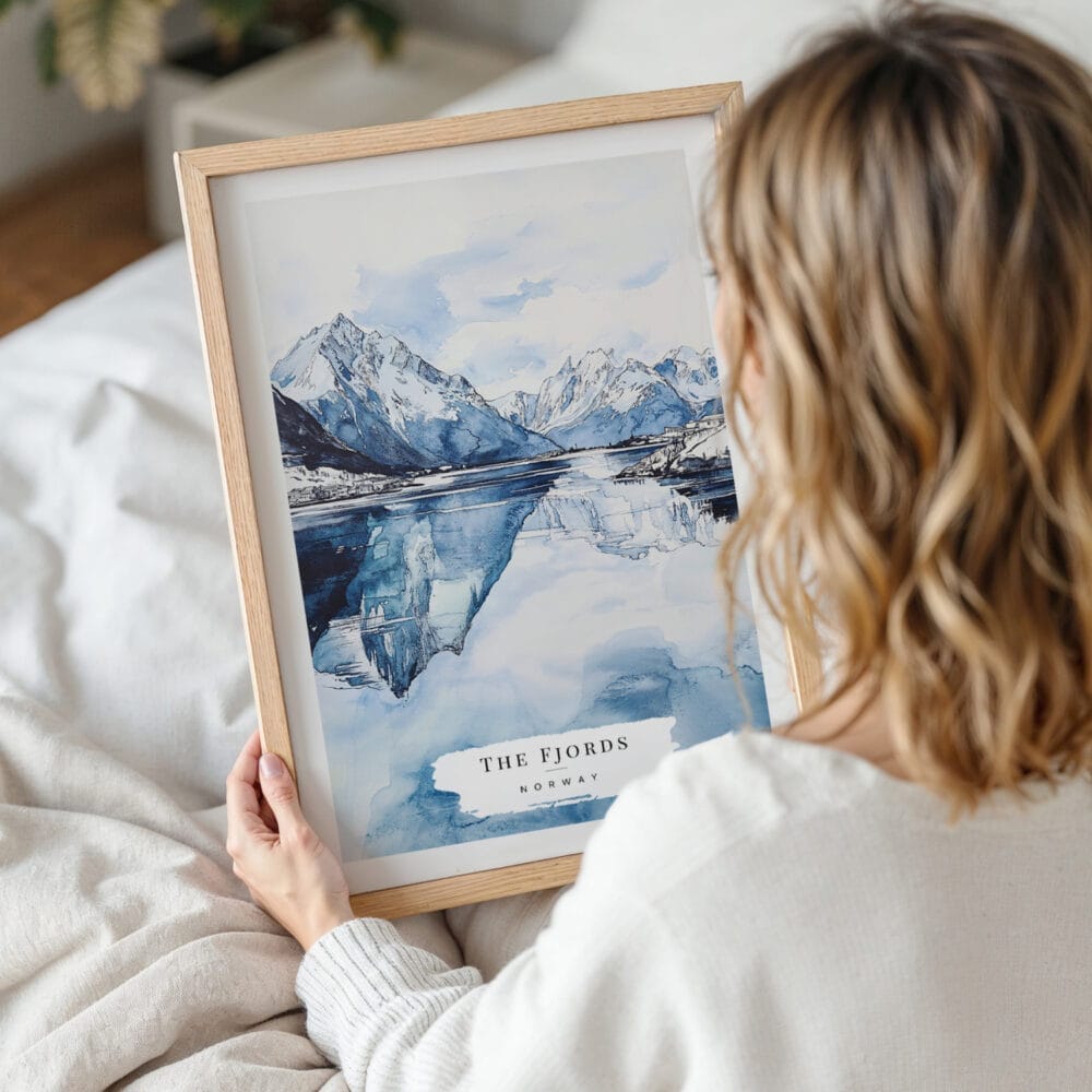 Woman Holding Framed Norwegian Fjords in Winter Watercolor Wall Art - Portrait Woman Holding Framed Norwegian Fjords in Winter Watercolor Wall Art - Portrait