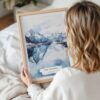 Woman Holding Framed Norwegian Fjords in Winter Watercolor Wall Art - Portrait