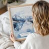 Woman Holding Framed Norwegian Fjords in Winter Watercolor Wall Art - Portrait
