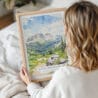 Woman Holding Framed Rocky Mountains Watercolor Wall Art - Portrait