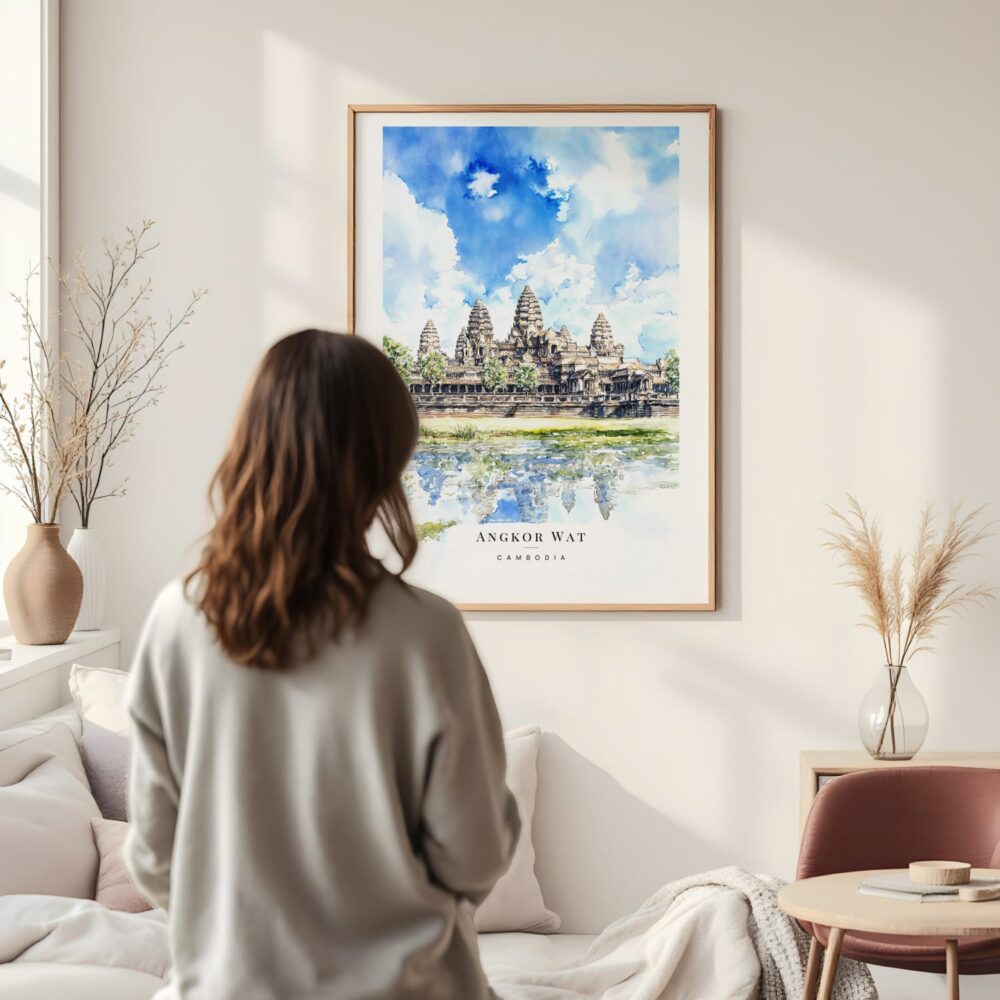 Framed Angkor Wat Cambodia Watercolor Wall Art - In Living Room with Woman Looking at it - Portrait Framed Angkor Wat Cambodia Watercolor Wall Art - In Living Room with Woman Looking at it - Portrait