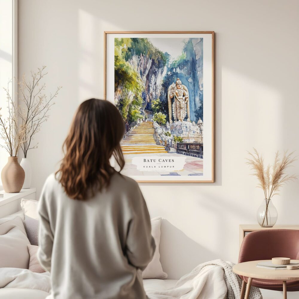 Framed Batu Caves Watercolor Wall Art - In Living Room with Woman Looking at it - Portrait Framed Batu Caves Watercolor Wall Art - In Living Room with Woman Looking at it - Portrait