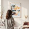 Framed Biscayne National Park Watercolor Wall Art - In Living Room with Woman Looking at it - Portrait