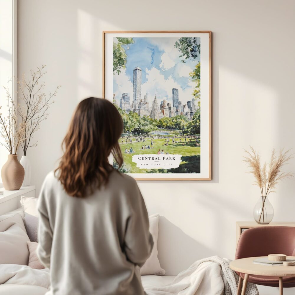 Framed Central Park New York Watercolor Wall Art - In Living Room with Woman Looking at it - Portrait Framed Central Park New York Watercolor Wall Art - In Living Room with Woman Looking at it - Portrait