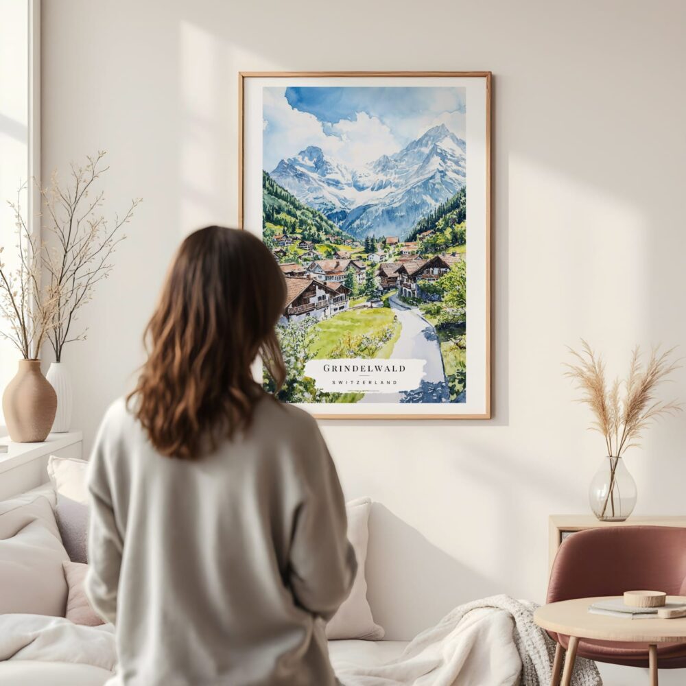 Framed Grindelwald Switzerland Watercolor Wall Art - In Living Room with Woman Looking at it - Portrait Framed Grindelwald Switzerland Watercolor Wall Art - In Living Room with Woman Looking at it - Portrait