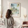 Framed Jamaica Caribbean Island Watercolor Wall Art - In Living Room with Woman Looking at it - Portrait