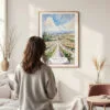 Framed Napa Valley Vineyard Watercolor Wall Art - In Living Room with Woman Looking at it - Portrait