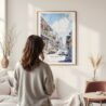 Framed New Orleans Bourbon Street Watercolor Wall Art - In Living Room with Woman Looking at it - Portrait
