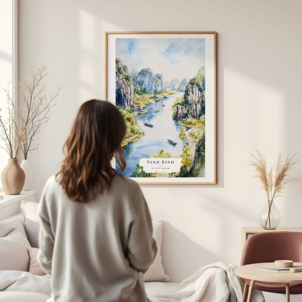 Framed Ninh Binh Vietnam Watercolor Wall Art - In Living Room with Woman Looking at it - Portrait Framed Ninh Binh Vietnam Watercolor Wall Art - In Living Room with Woman Looking at it - Portrait