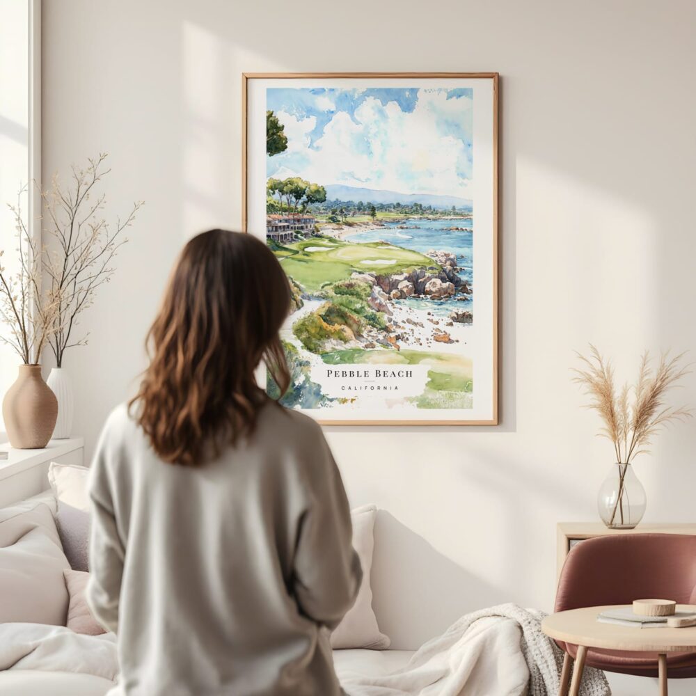 Framed Pebble Beach Golf Course Watercolor Wall Art - In Living Room with Woman Looking at it - Portrait Framed Pebble Beach Golf Course Watercolor Wall Art - In Living Room with Woman Looking at it - Portrait