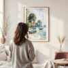 Framed Phuket Thailand Watercolor Wall Art - In Living Room with Woman Looking at it - Portrait